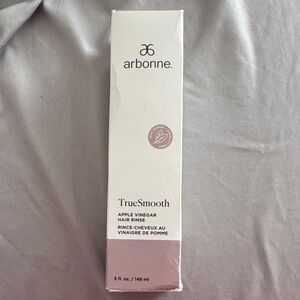 Arbonne TrueSmooth Hair Rinse in White and Pink